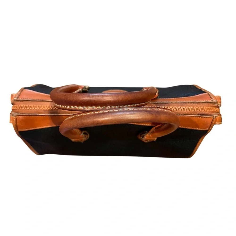 Dooney & Bourke All Weather Handbag Satchel Pebble Grain Black and Tan, 1980s